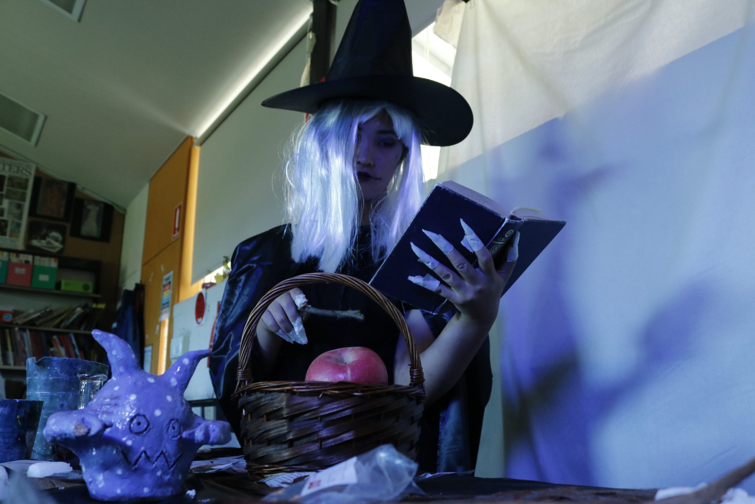 Witch Conducting Spells - Low Angle